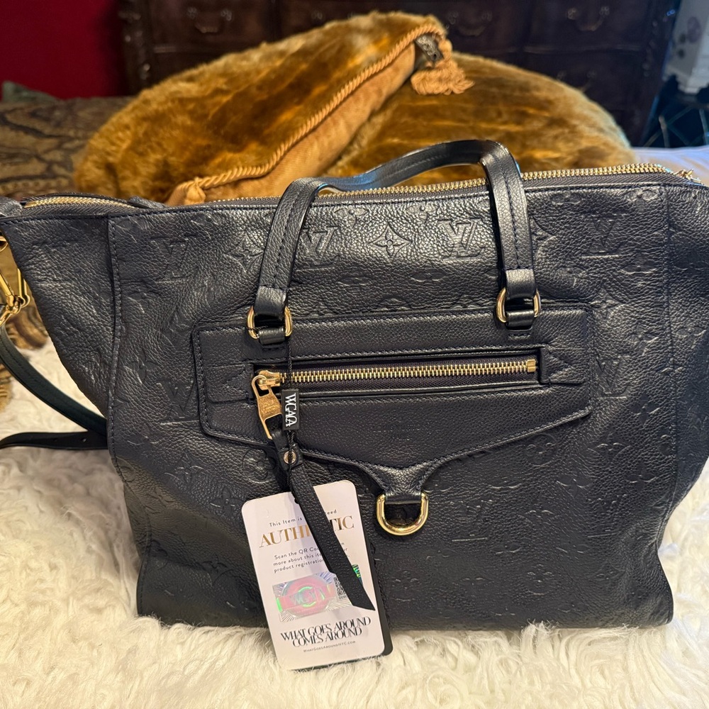 Elegant Blue Embossed authentic Louis Vuitton Shoulder Bag with wallet